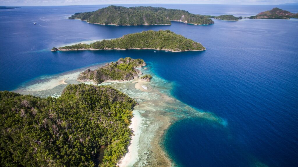Drone shot of pristine cruising grounds for yachts in Raja Ampat